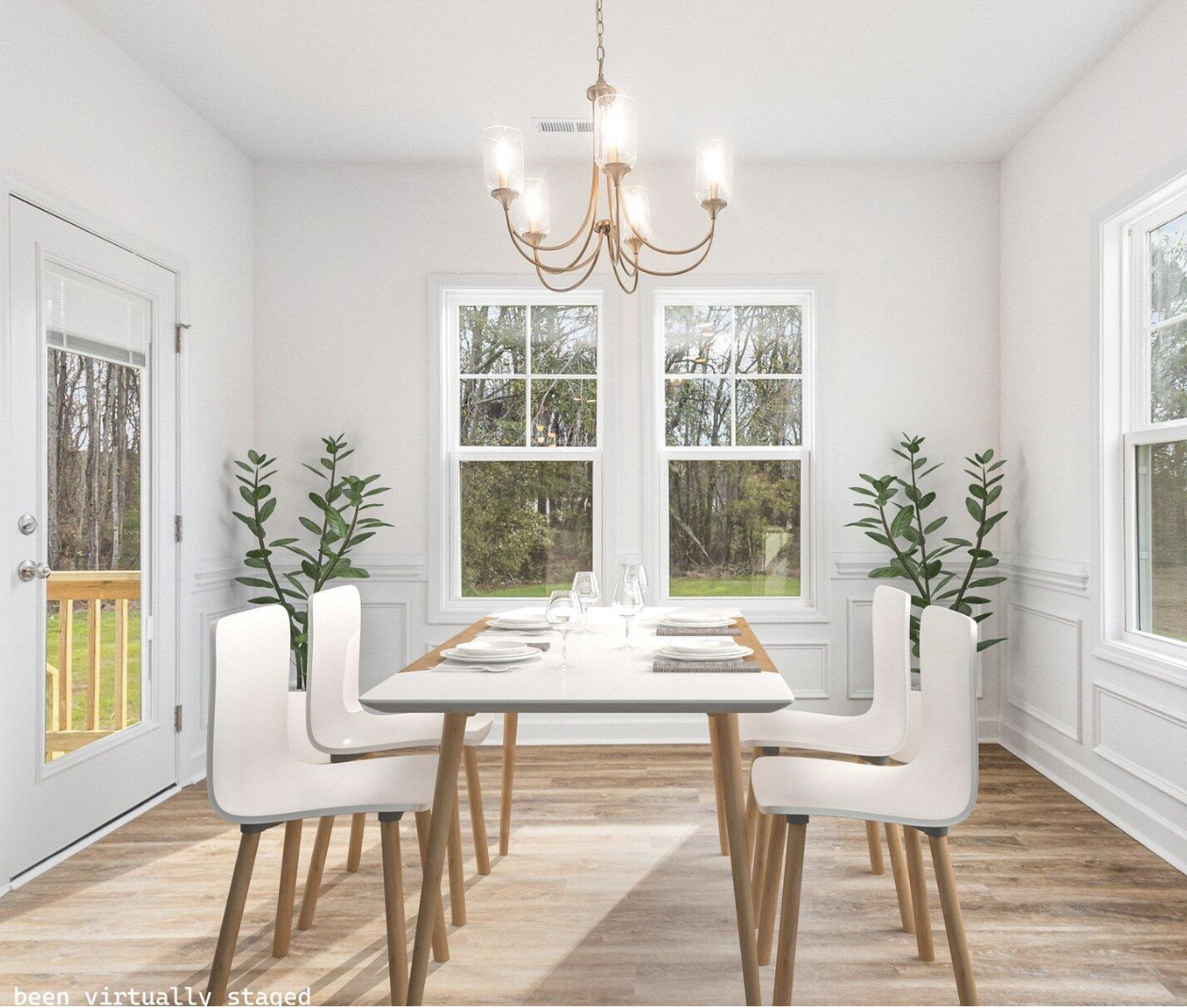 Illustrative dining area with virtual staging; finishes vary by home